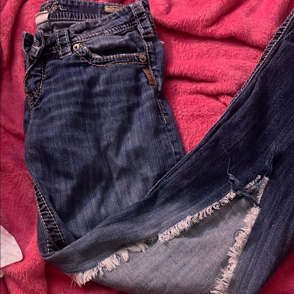 Distressed Blue Denim Jeans